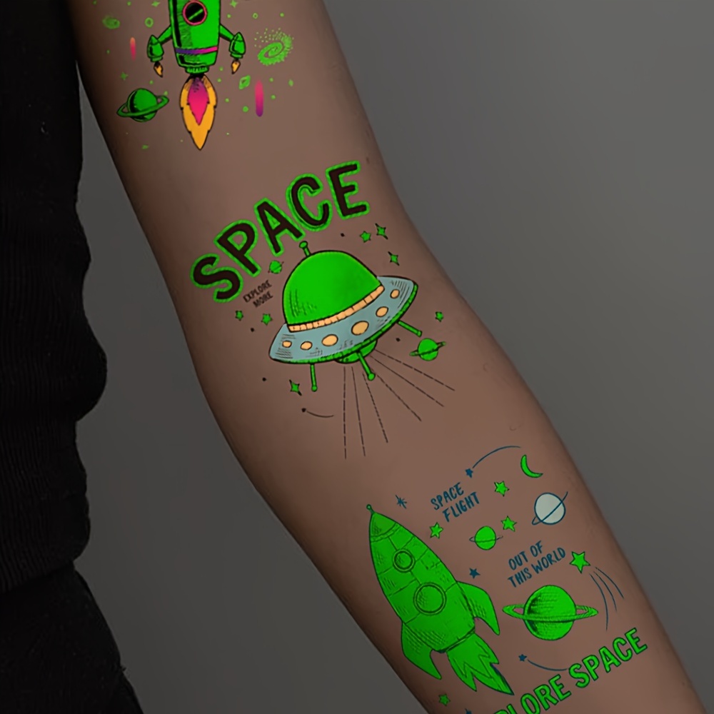 Brillando En La Oscuridad Tatuaje Pegatinas NASA Astronauta Ovni Alien  Luminoso Tatuajes Falsos Temporales Para Los Niños Cara Brazo Pierna Arte  Del Cuerpo