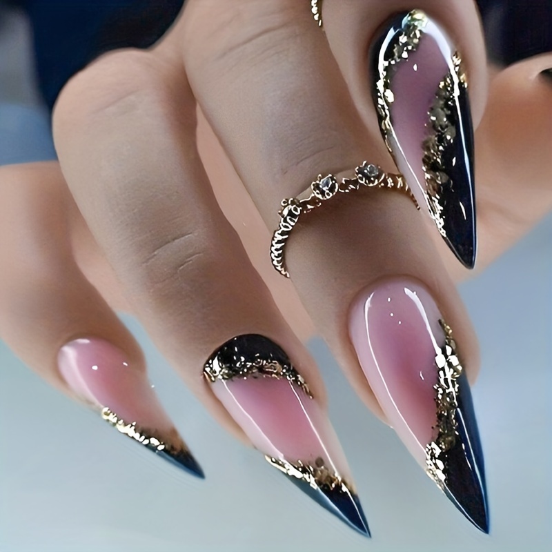 Nude almond stiletto/almond gel nails. Rose gold foil strips. Black gems.  #caatsnailsandbeauty