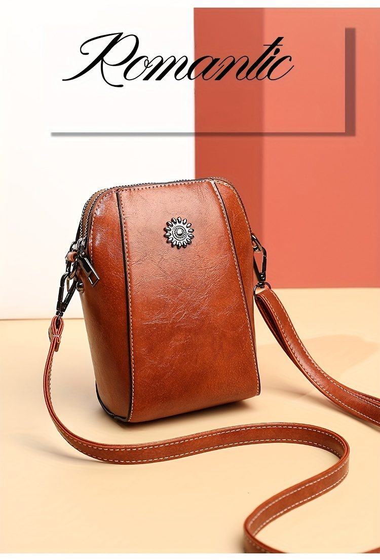 Metal and leather crossbody with hotsell decorative details