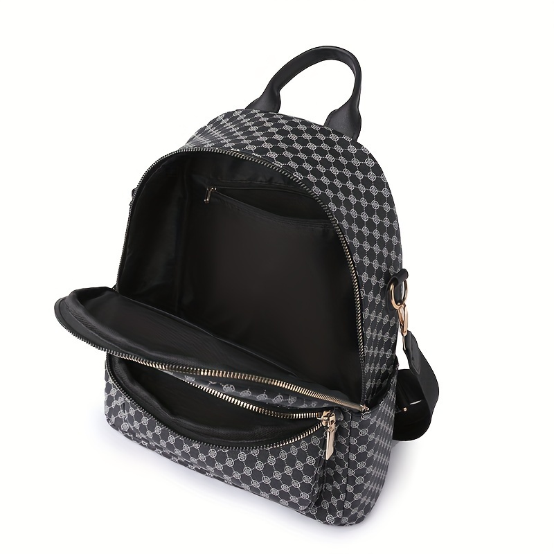A black PU fashionable dot print combination backpack for daily