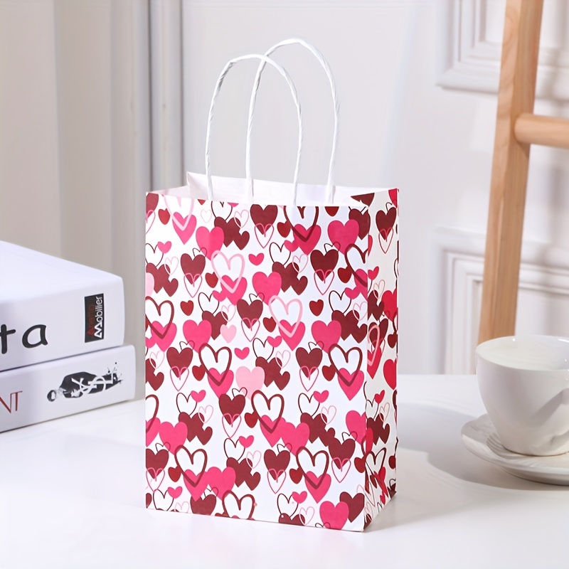 4 Large Valentines Day Gift Bags w/Tissue Paper Included Designed with -  XOXO, Be Mine, Hearts, & More 