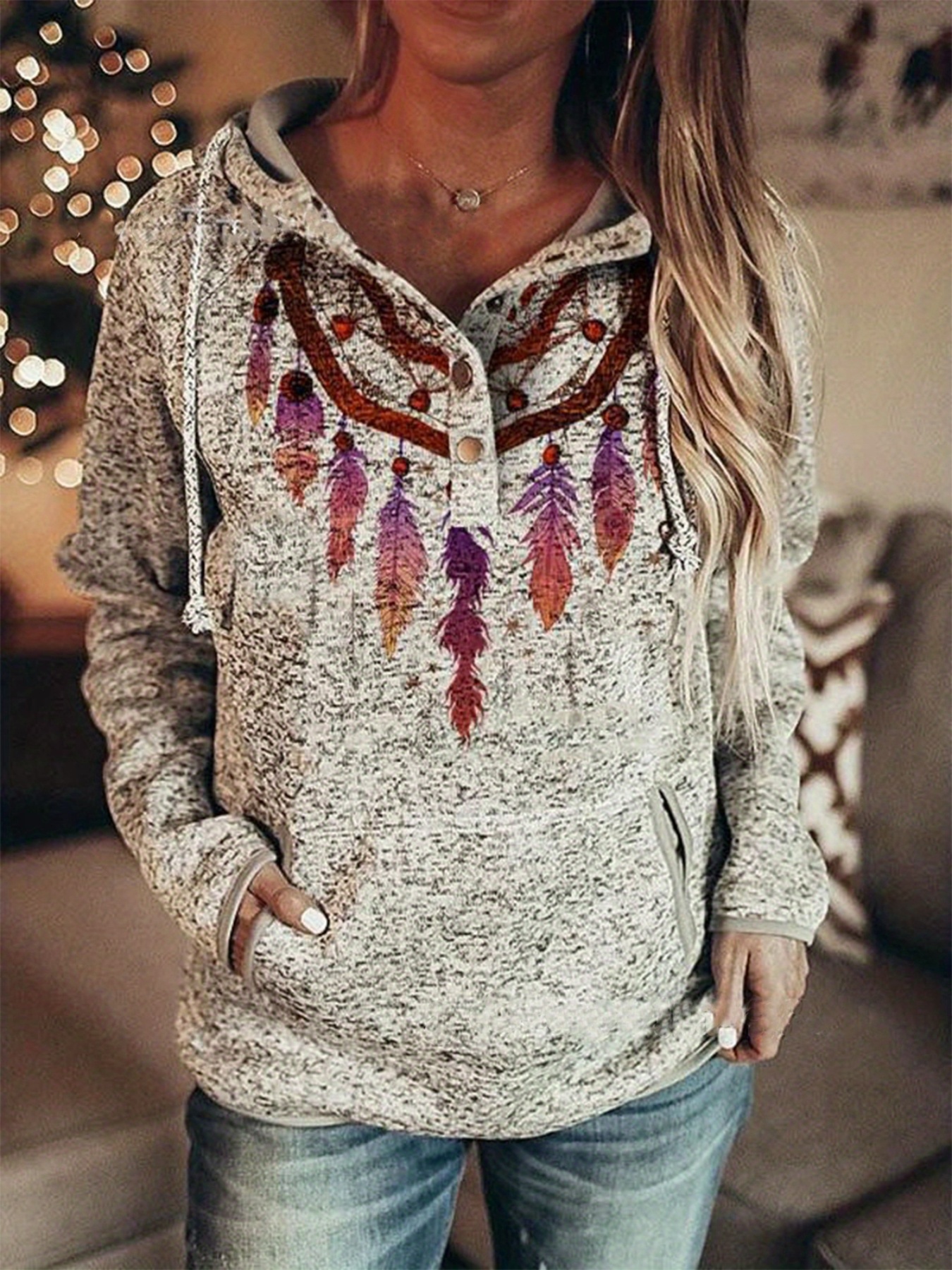 FEATHERS NECKLACE OVER HOODIE