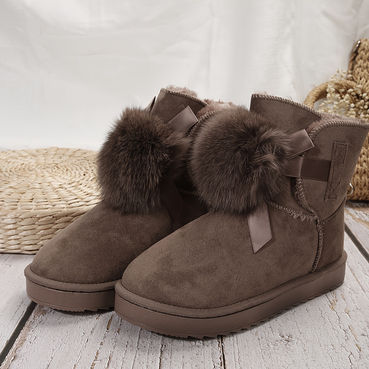 Ugg boots with 2025 fur balls