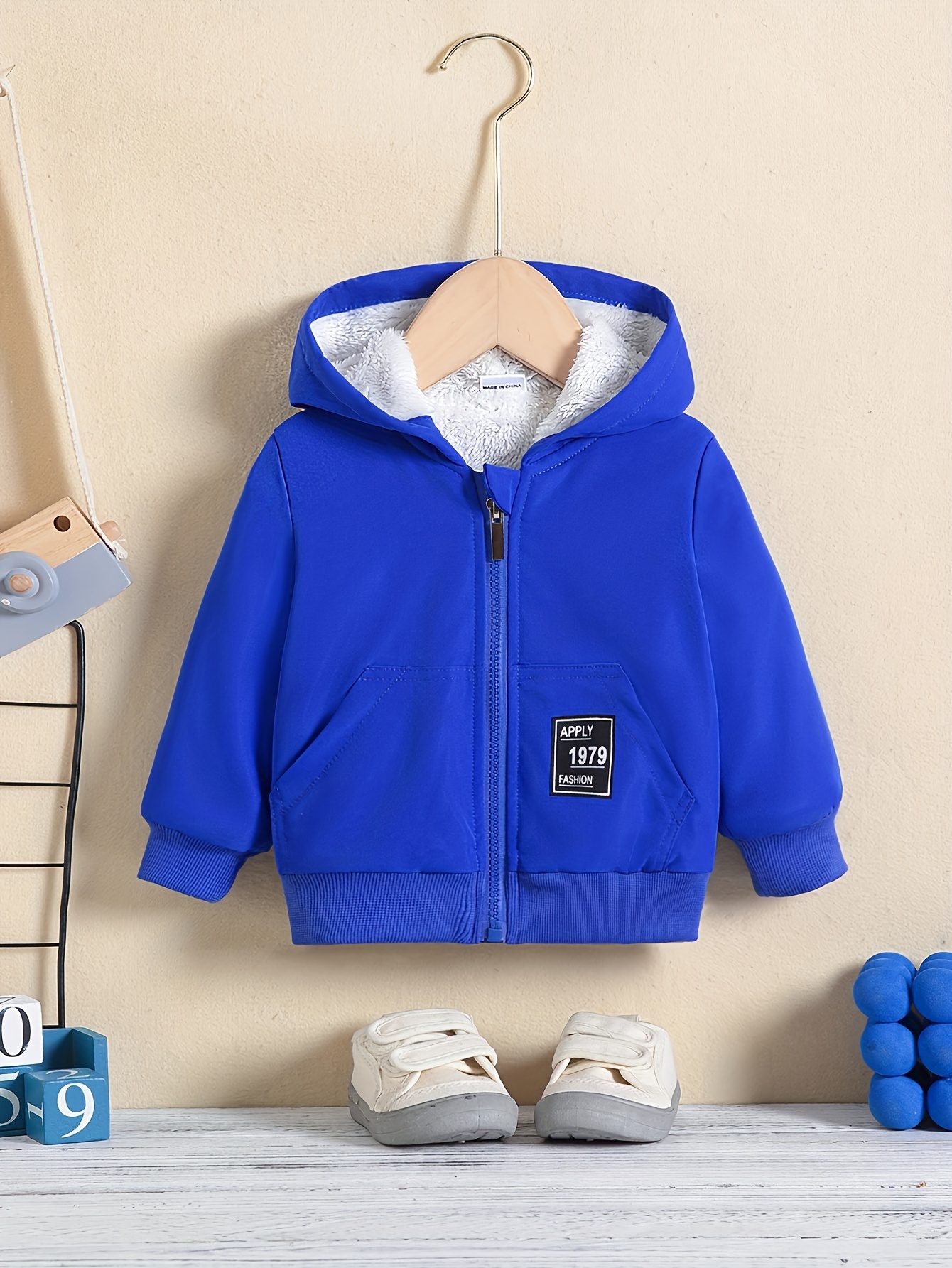 Chaqueta polar con capucha de niño azul