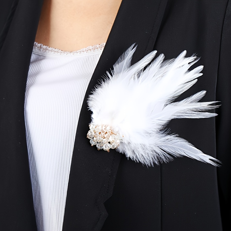 White feather deals brooch