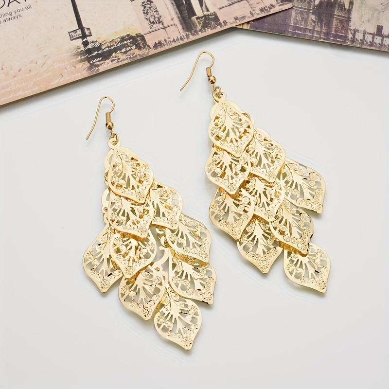 

Is A Wide Of Fashionable And Exaggerated Long Tassel Earrings With A Golden European And American - Fashion.