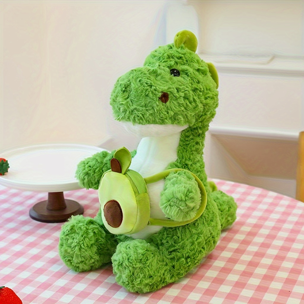 La peluche bébé dinosaure