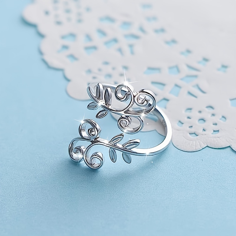 Adjustable Open Leaf Ring with Intricate Filigree Details