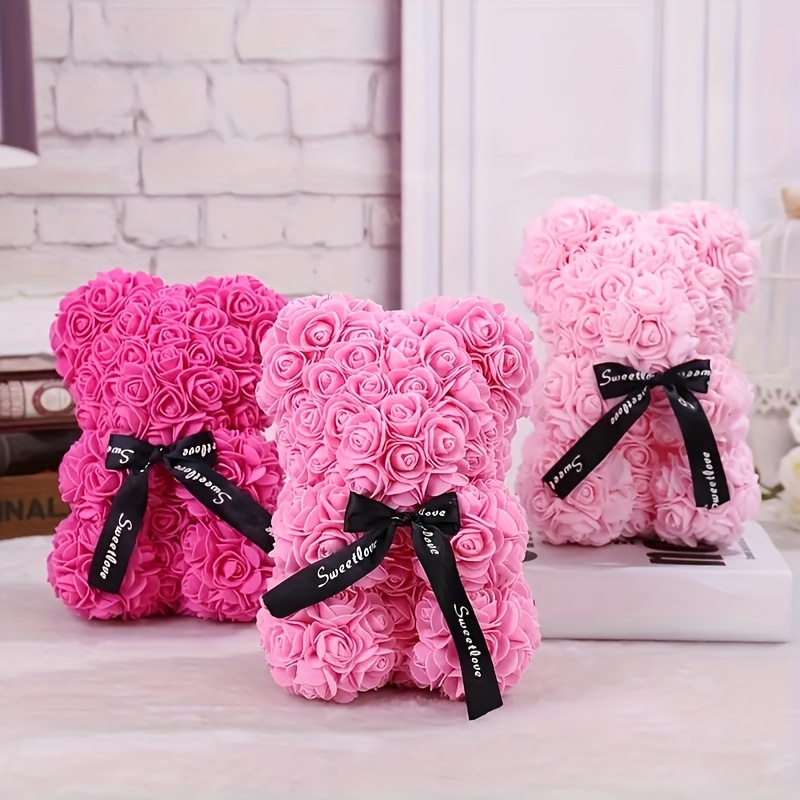 Regalos únicos, oso rosa, oso de peluche rosa en una caja de