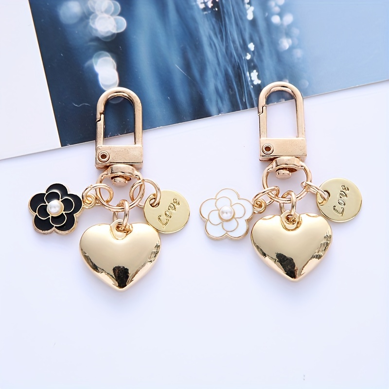 

Metal Love Keychain Cute Camellia Letter Round Brand Metal Accessories Earphone Cover Bag Decoration