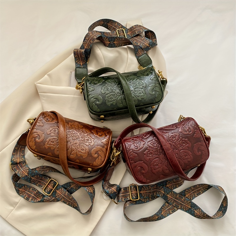 The “Deadwood” crossbody feed bucket style purse – Triple J