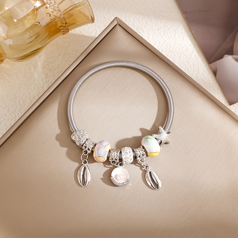 Bracciale in oro rosa e bianco con diamanti - ALFIERI & ST. JOHN