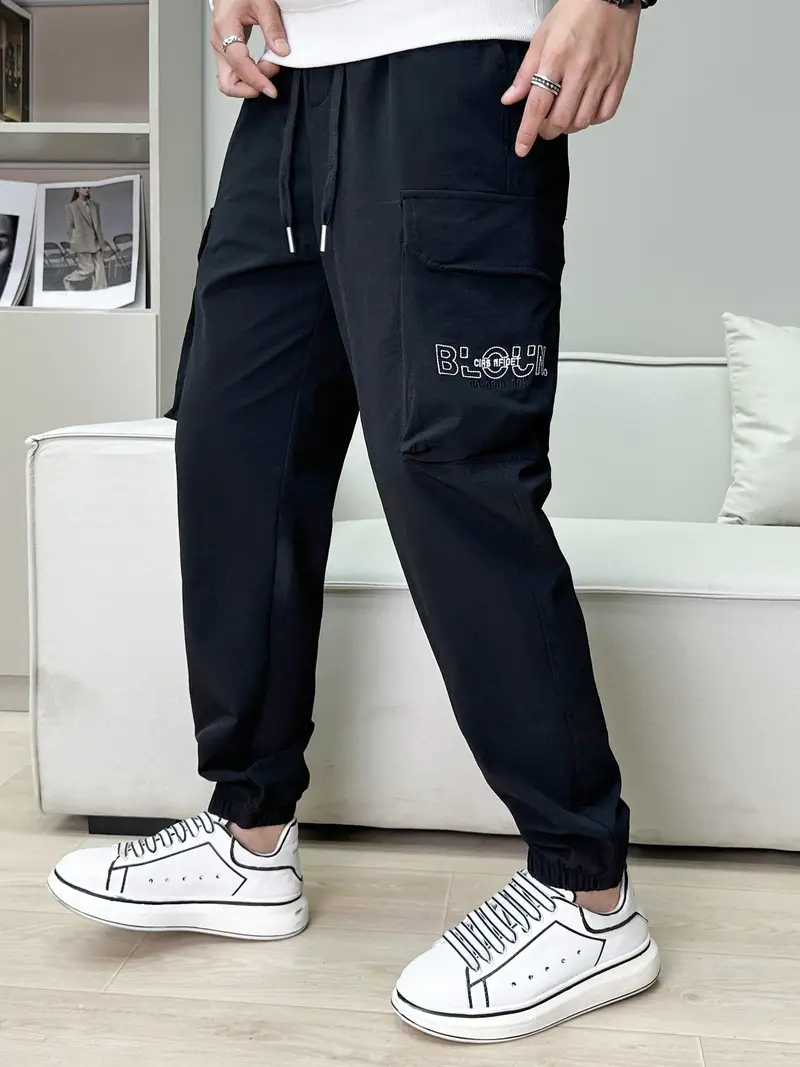 Hombres Pantalones deportivos con estampado de letra con costura