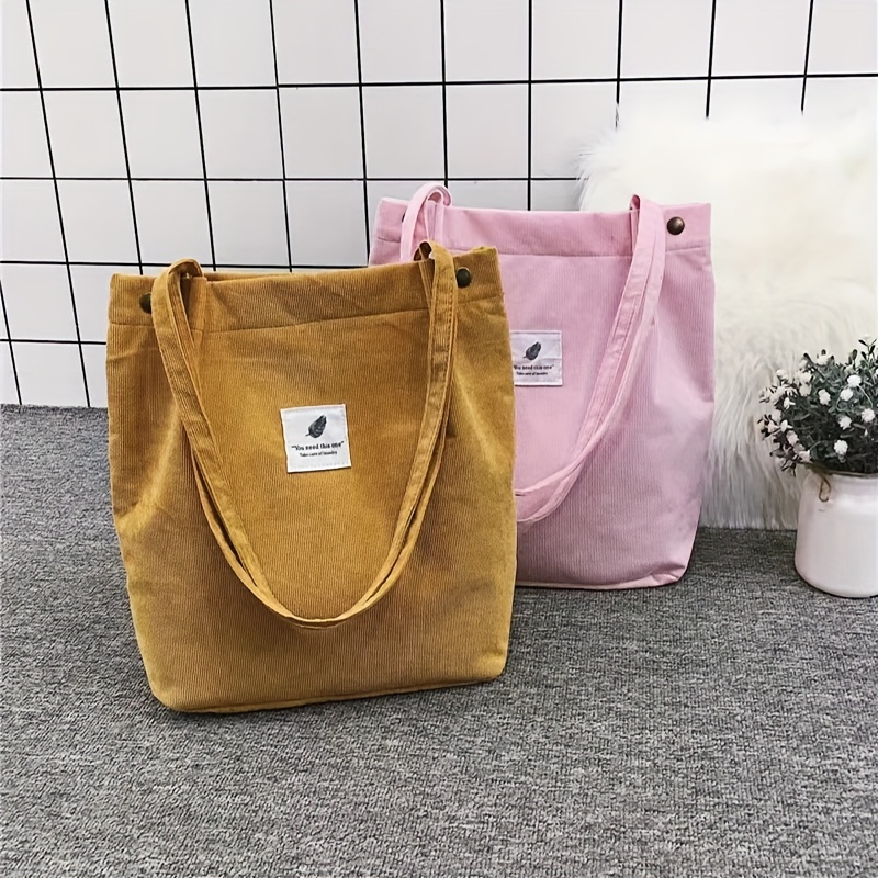 Petit sac à bandoulière Lita en toile à logo et en cuir à deux tons