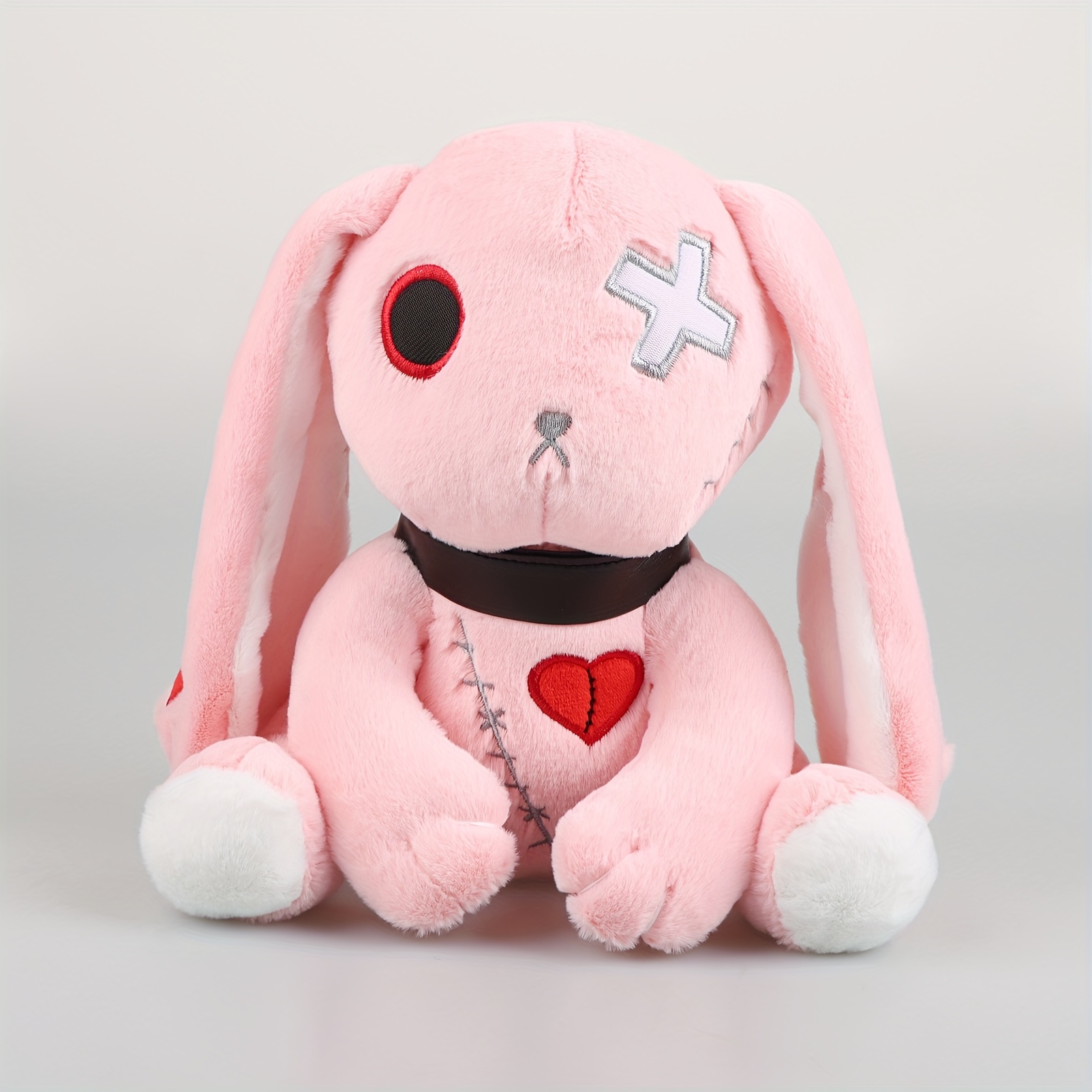 Creepy black bunny plush. Scary stuffed animal. Rabbit toy.