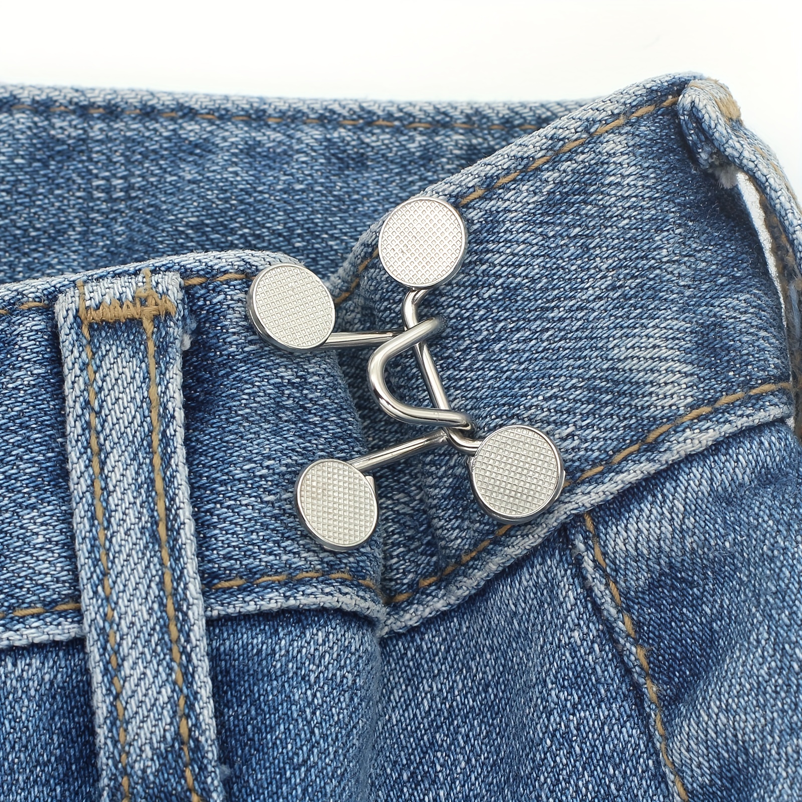 Jeans avec bouton pression invisible pour ceinture, artefact de
