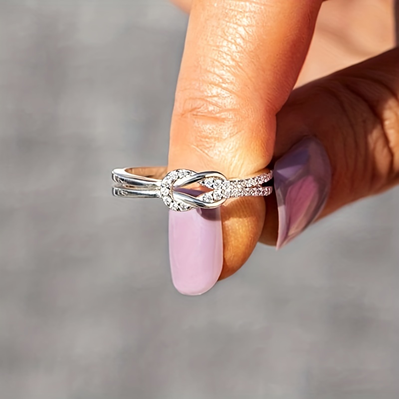 S925 Silvery Infinity Ring with Cubic Zirconia Sparkle