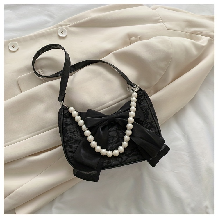 Satin crossbody bag best sale with faux pearl handle