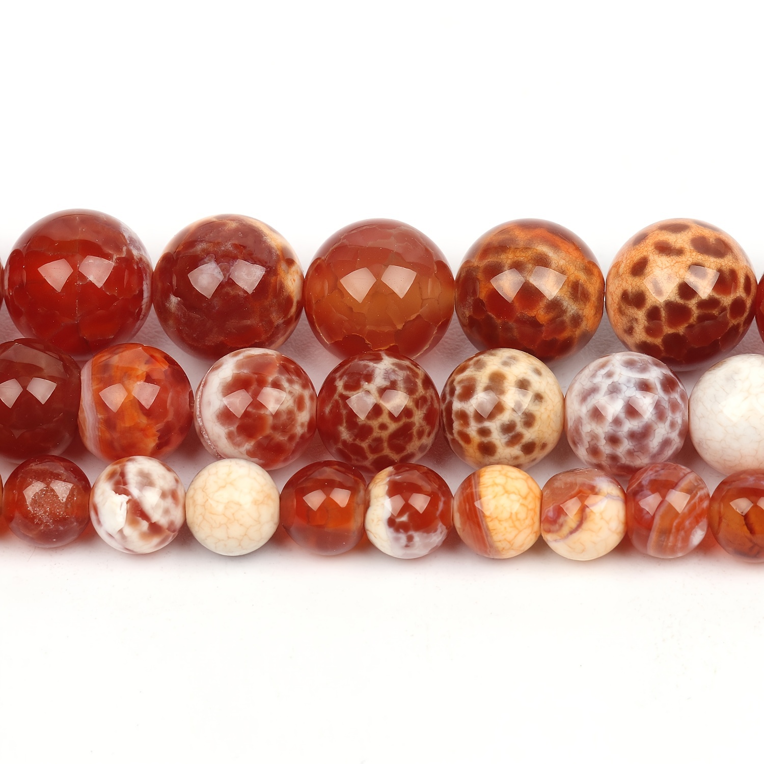 Faceted Natural Red Fire Agate Gemstone Round Loose Beads on a