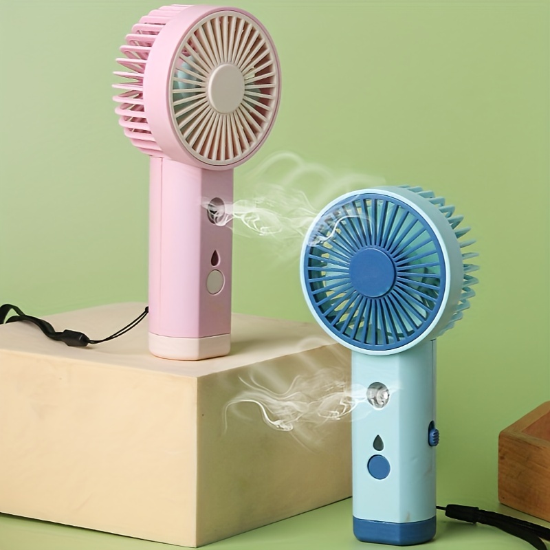 Compre Mini Enfriador De Mano Recargable Con Spray De Agua Portátil  Desmontable Ventilador De Mano Soporte Para Teléfono Ventilador De  Refrigeración Por Aire Ventiladores De Mano y Mini Ventiladores de China por