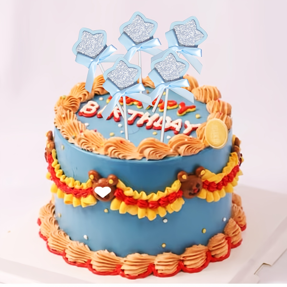 Vertical shot of a birthday cake decorated with shiny festive candles Stock  Photo - Alamy