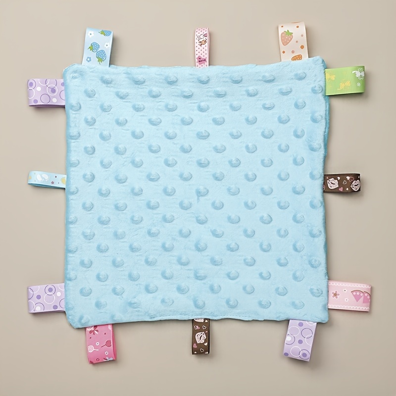 Baby blanket with best sale tags all around it