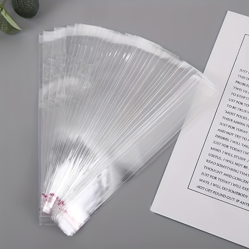 

100pcs Transparent Self-adhesive Seal Bags, Wedding Birthday Parties Jewelry Accessories Stationery Pen Gift Necklace Bracelet Packaging, Slender Opp Sealing Bags Small Business Supplies
