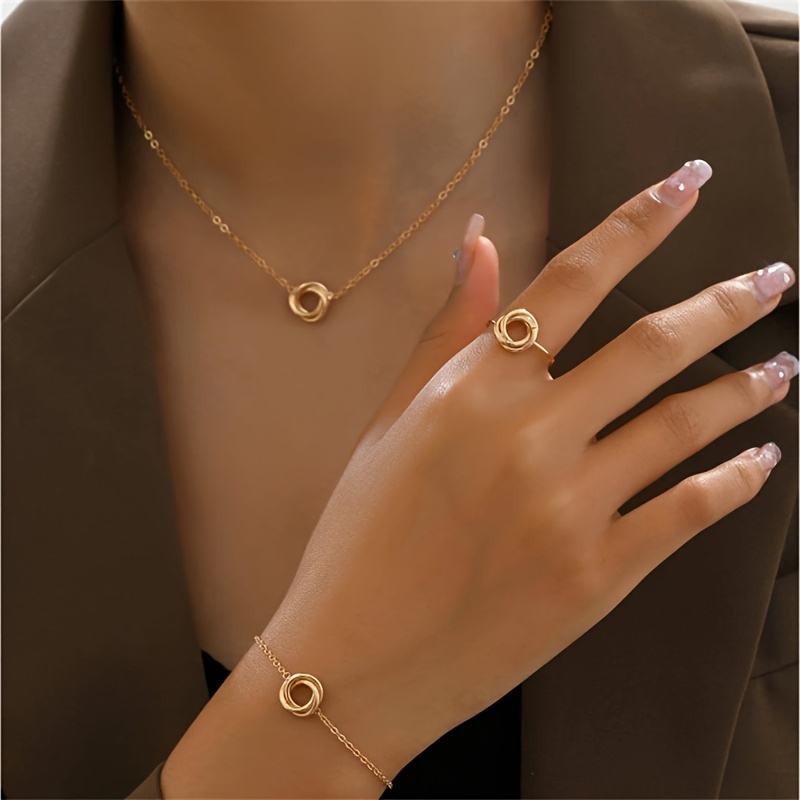 

Minimalist Ring Shaped Jewelry Set Iron Golden Color Necklace Bracelet And Ring Set Jewelry Set For Daily And Commuting Wearing Accessories