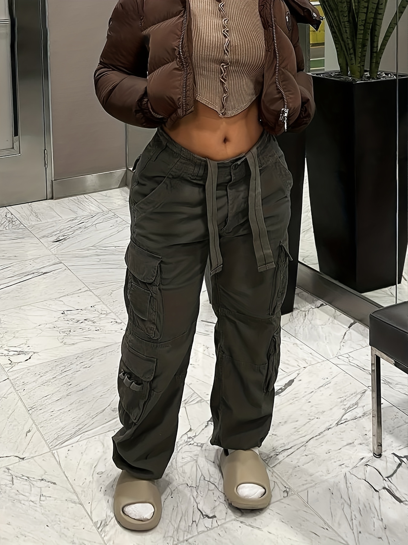 90s Trousers with a Crop Top and Space Boots.