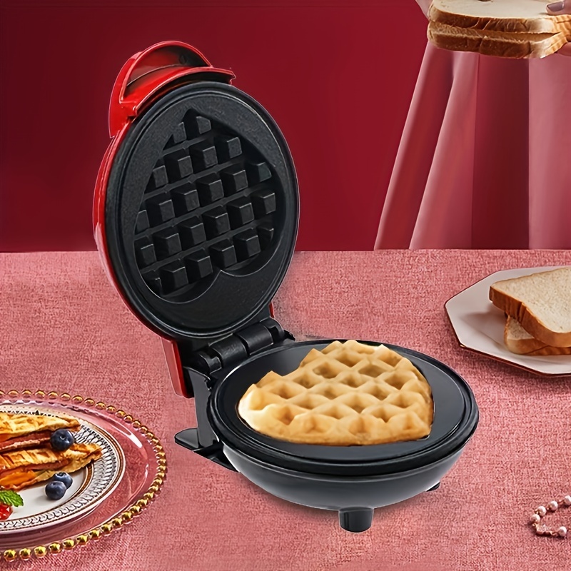 Máquina para hacer gofres PAC-MAN. Crea hasta cuatro deliciosos waffles a  la vez, incluyendo PAC-MAN y tres formas de fantasmas. Alimentado por red.
