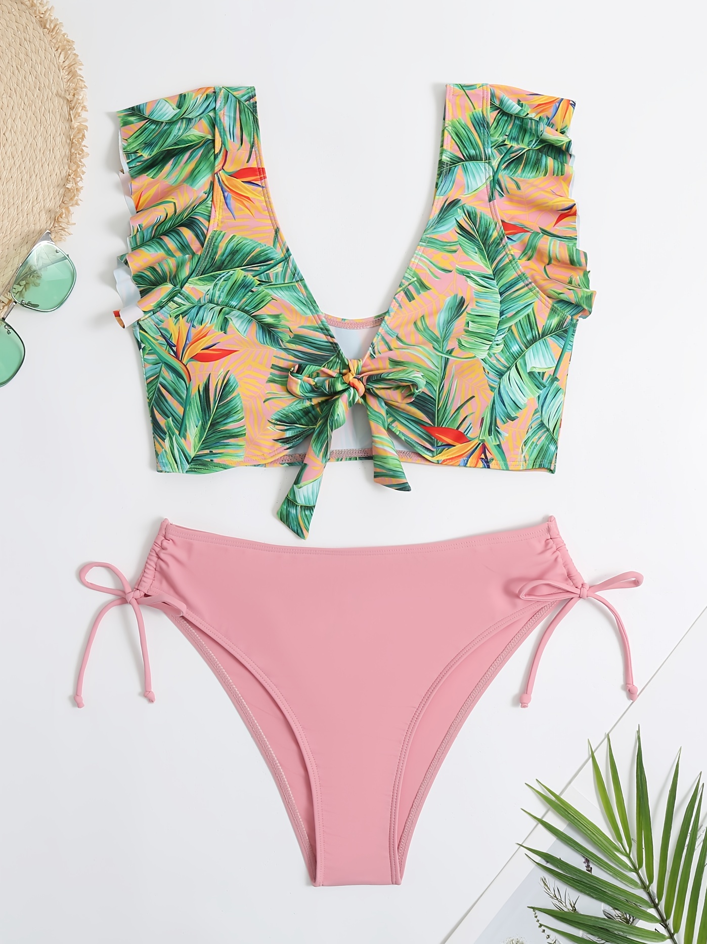 pink swimsuit with palm leaves