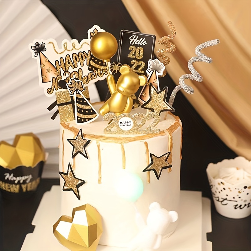 New Year Black And Gold Drip Cake