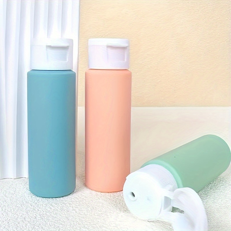 4x 60ml Bottiglie da viaggio riutilizzabili in silicone approvate per  l'imbarco - Bottiglie ricaricabili, Kit contenitore per bottiglie da viaggio,  Contenitori da viaggio in silicone, per shampoo - Italia, Nuova -  Piattaforma