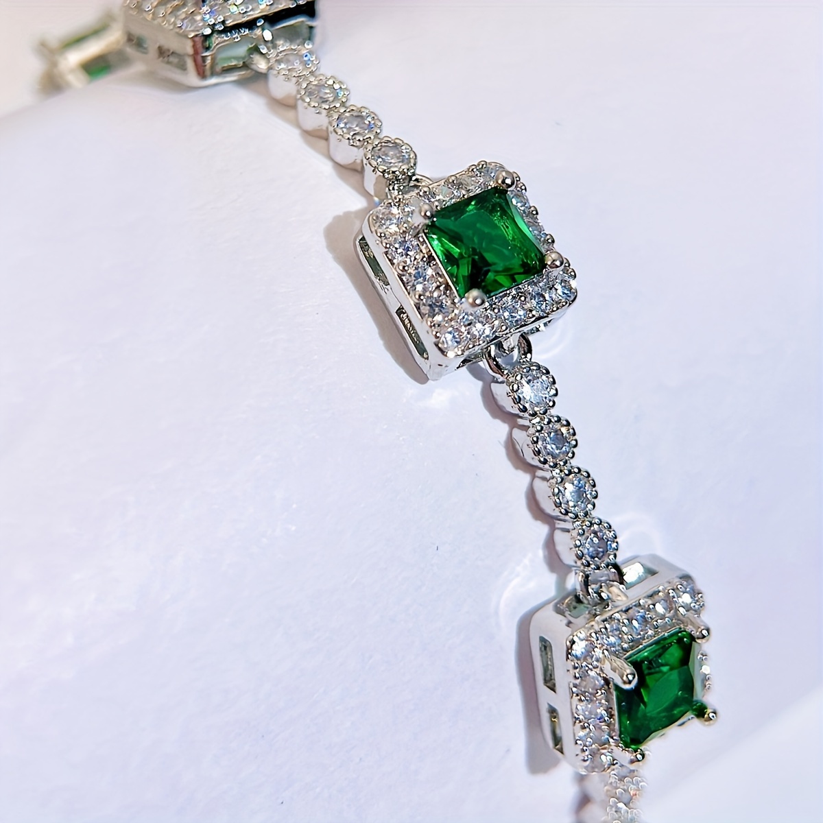 A Beautiful Green Cubic Zirconia Bracelet with a Silvery Golden Fashion Square Charm, Perfect for Women'S Evening Wear