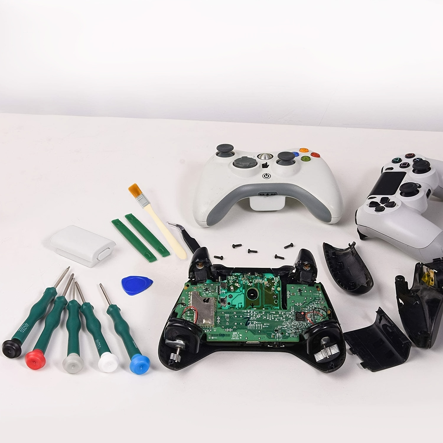 JOREST Kit Demontage PS4 PS3 PS5 Xbox one/360, 11pcs Kit Nettoyage, Outil  Reparation pour Manette et Console, avec Tournevis Torx T6 T8 T10 et PH0,  Pieds Biche, Pinces à épiler, Brosse 