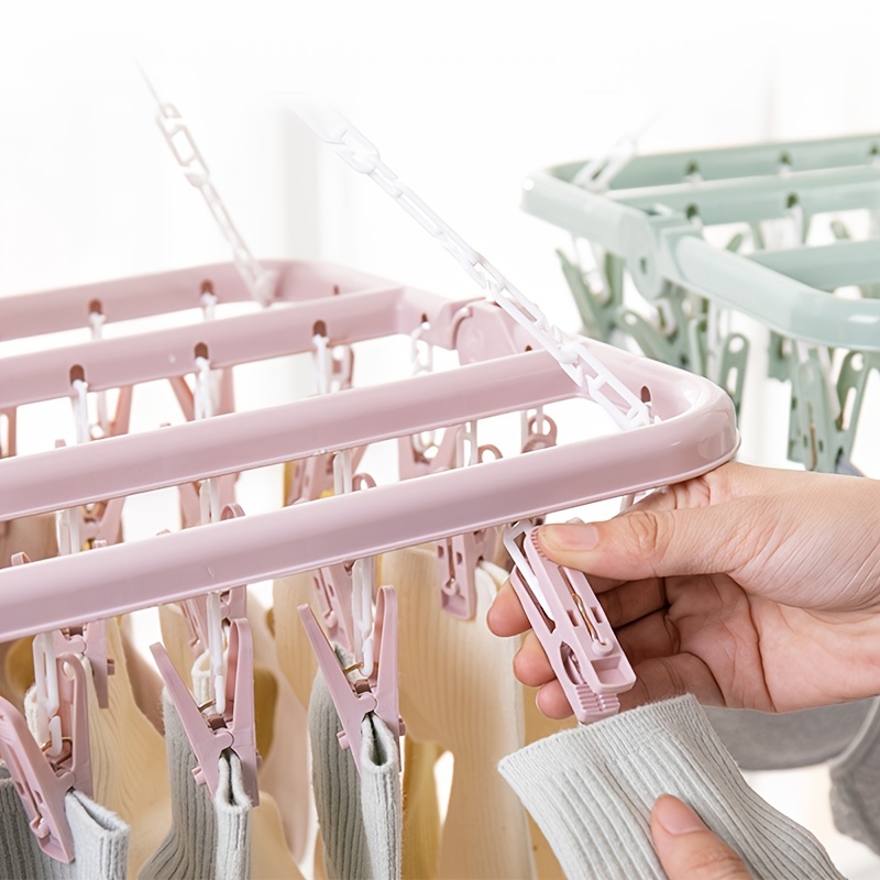 Repurpose Those Clips On Plastic Hangers Into A Handy Household Gadget