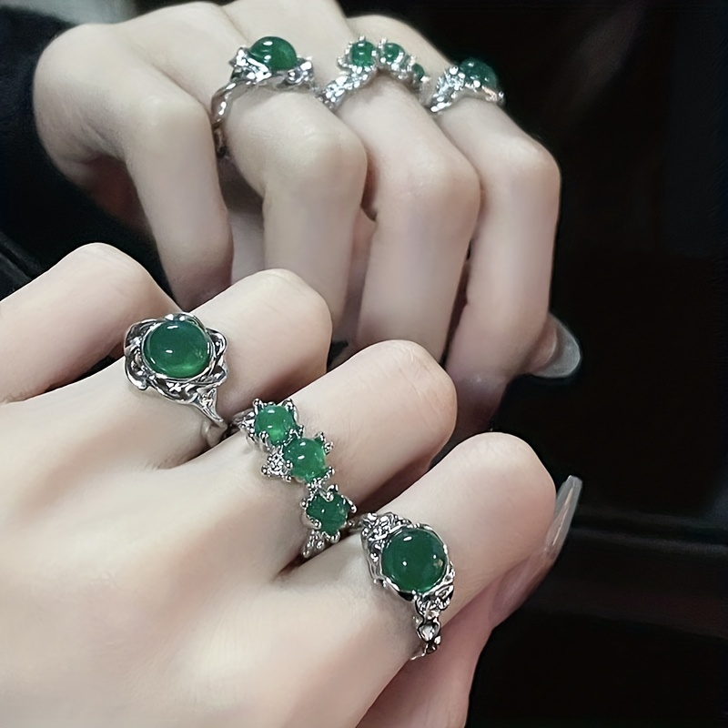 Green stone finger deals ring design