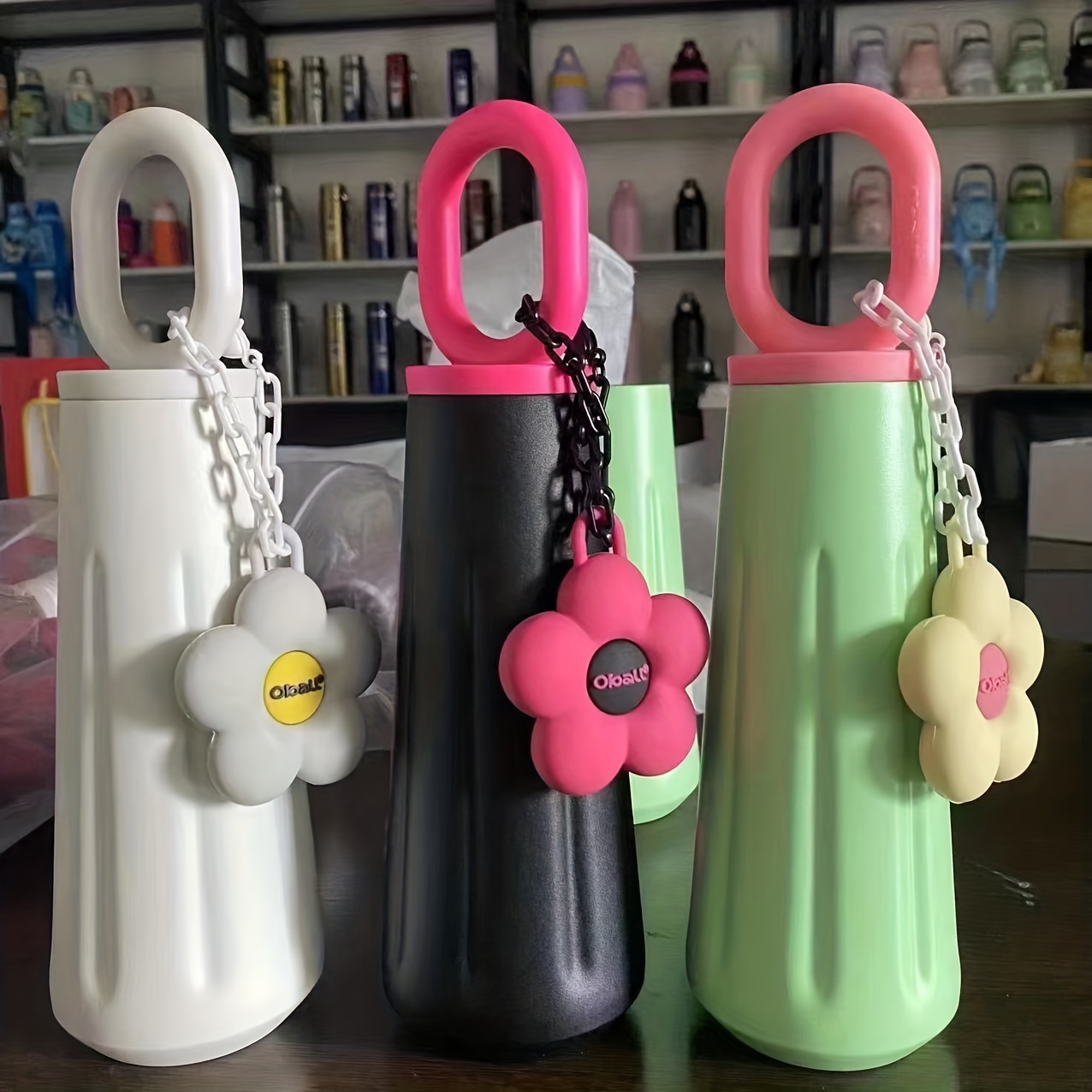 stylish durable   steel water bottle leakproof portable with handle flower charm bpa free ideal for outdoor activities camping travel fits   in car cup holder outdoor hydration floral charm design leakproof design insulated water bottle Product details 3