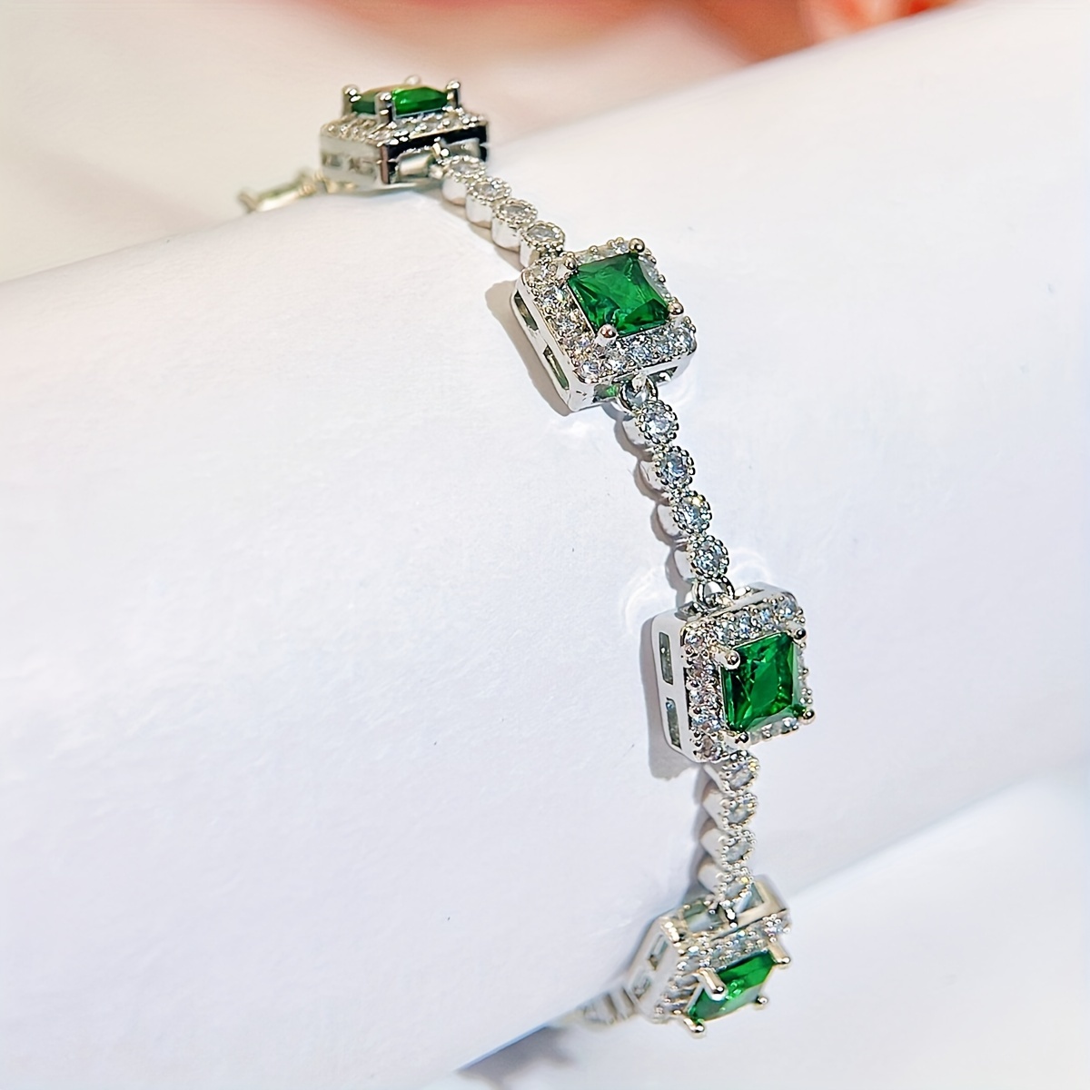 A Beautiful Green Cubic Zirconia Bracelet with a Silvery Golden Fashion Square Charm, Perfect for Women'S Evening Wear