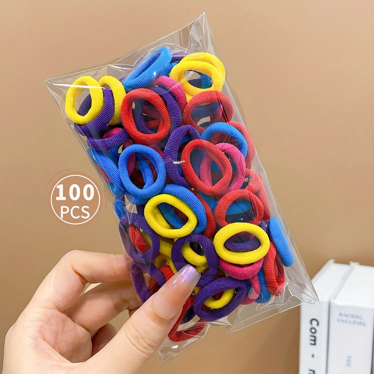 Paquete de 200 gomas para el cabello para niñas de color caramelo