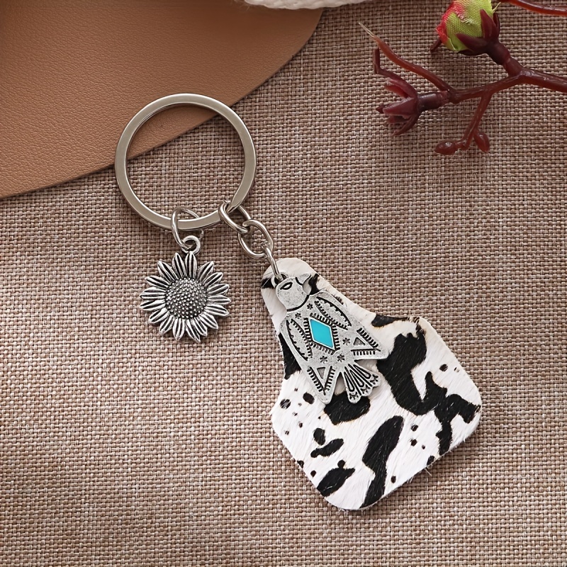 Wholesale Cow Print Leather tassel Cow head wood shavings Charm Tassel  keychain Retro geometric cow shape keyring wristlet From m.