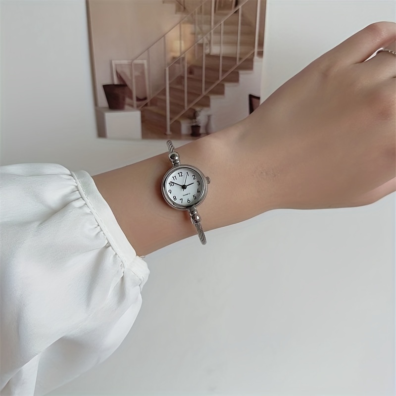 Tiny hot sale wrist watch