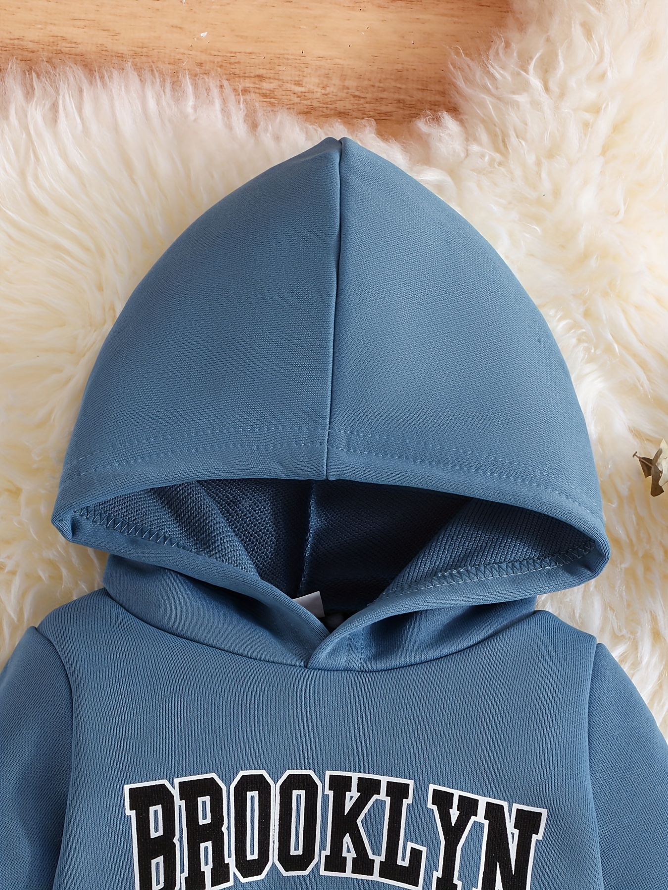 Brooklyn Baby Blue Zippered Hoodie. 