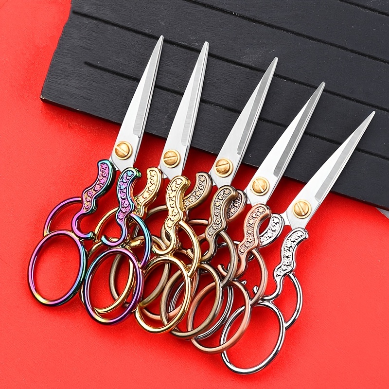 Premium AI Image  Isolated small vintage sewing scissors golden white  background