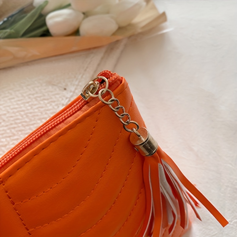 Large orange hot sale clutch bag