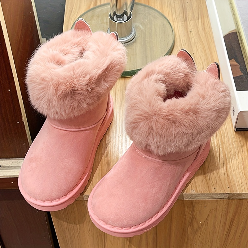 Pink ugg outlet boots with fur