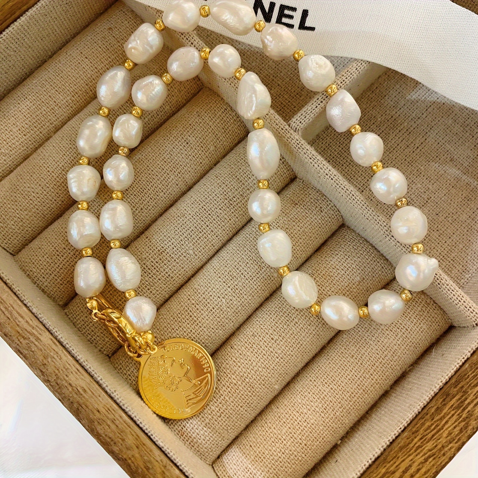 Chanel pearl necklace on sale men