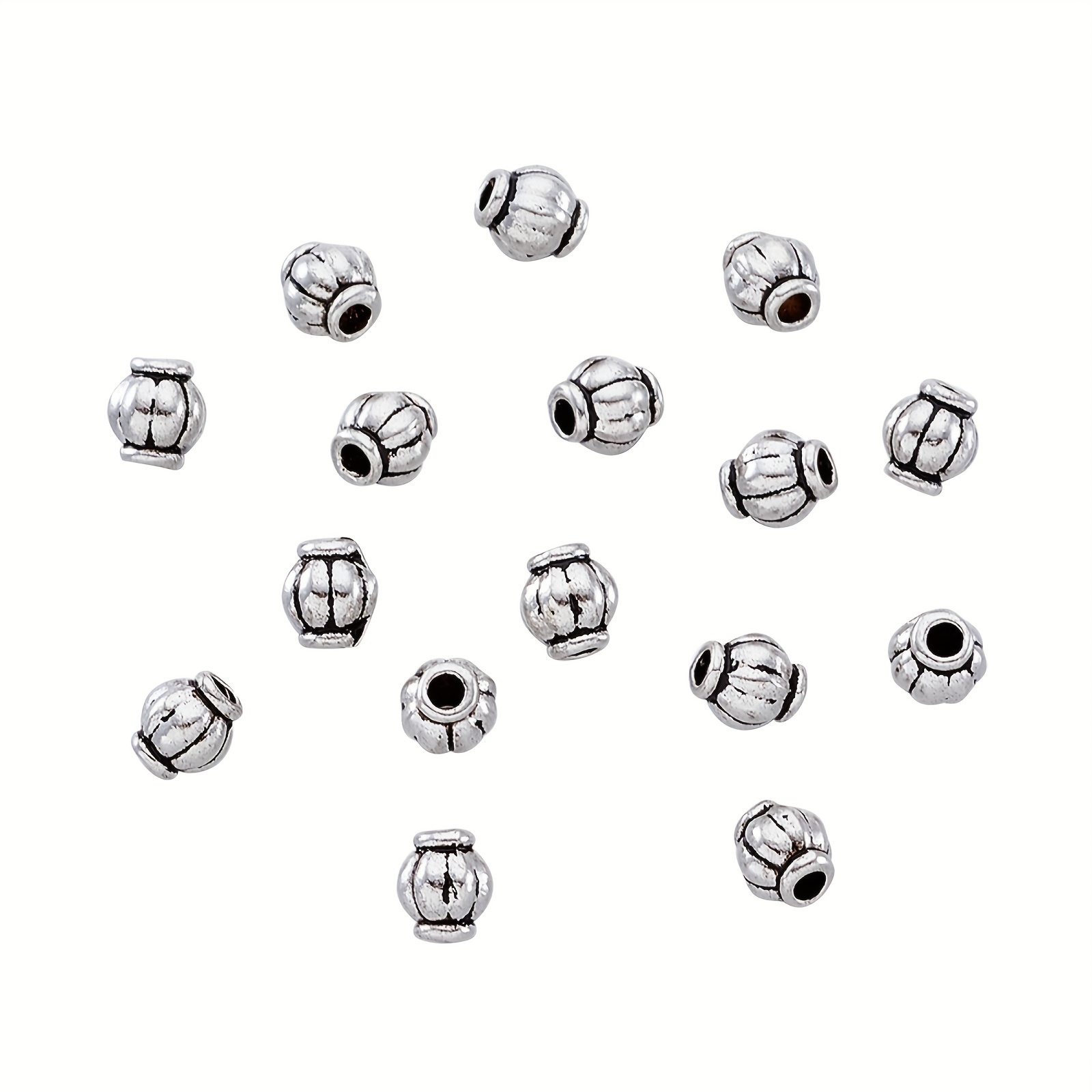NBEADS 720 Pcs Antique Alloy Spacer Beads, Tibetan Charm Spacers