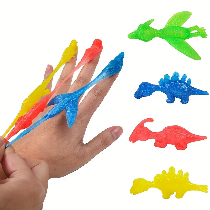 Jouets de doigt de dinosaure Slingshot – Jouets de dinosaure volant en  caoutchouc, jouets de doigt de dinosaure de lancement, jouet extensible de  jeu