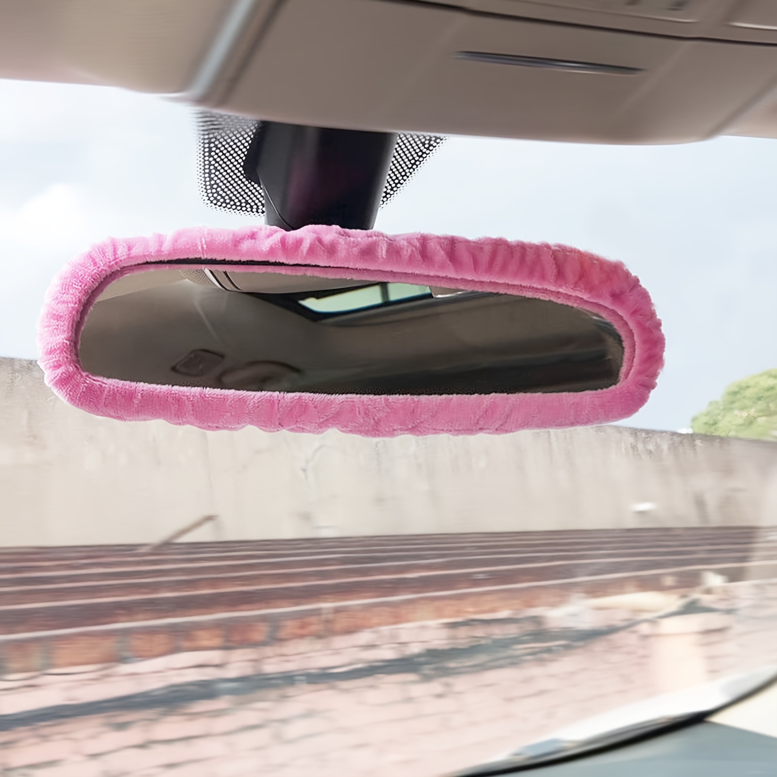 

Add A Pop Of Color To Your Car With This Adorable Peach Plush Rearview Mirror Cover!